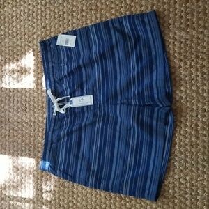 NWT. Southern Tide unlined swim trunks in seven seas blue. 7 inch inseam